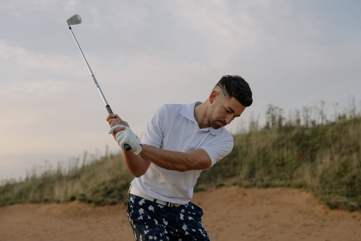 Golfer being coached by a PGA professional